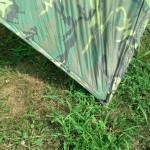 using twigs for tent stakes at the corners.